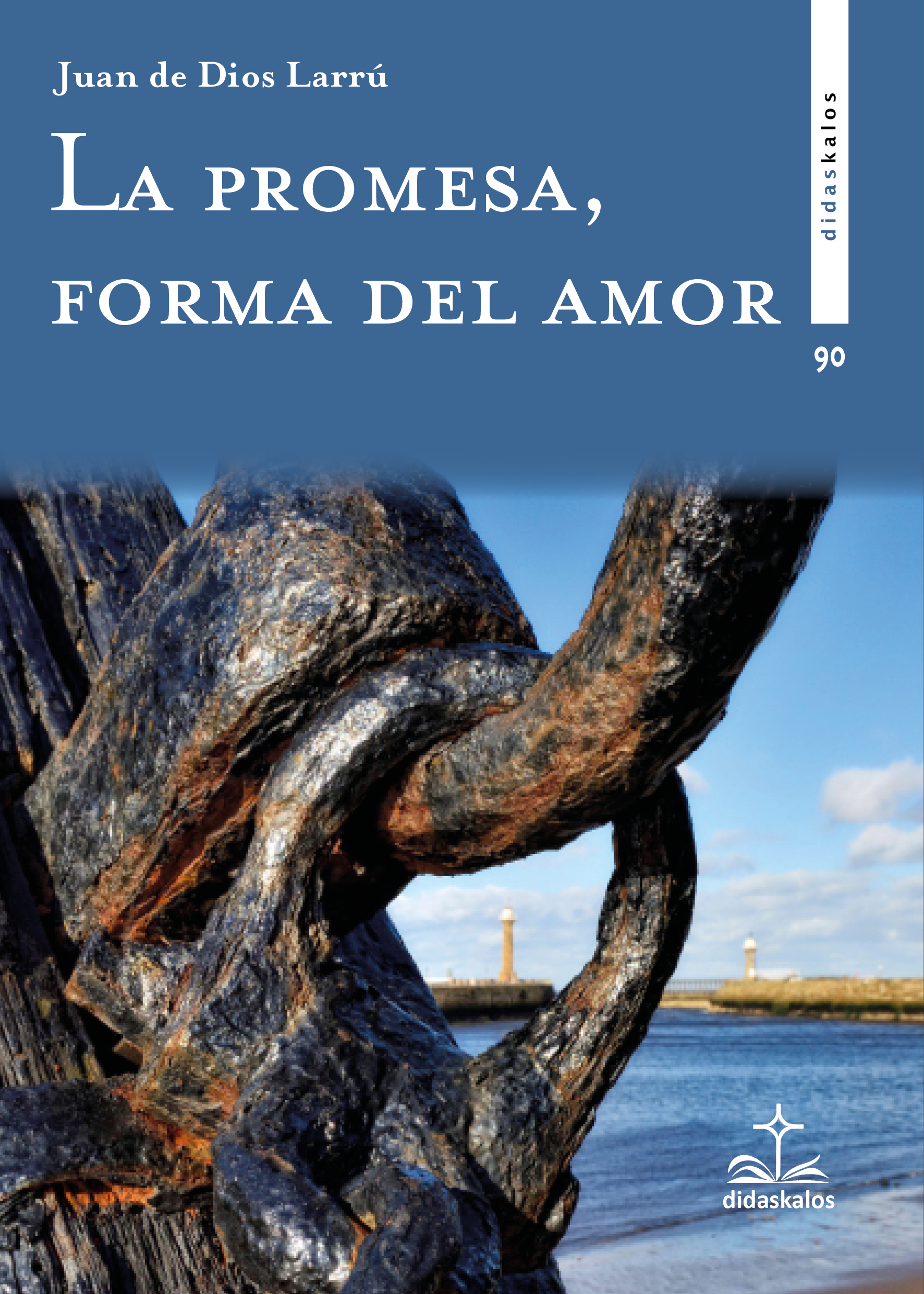 Portada del libro La promesa, forma del amor de Juan de Dios Larrú, número 90 de la colección Didaskalos. La imagen muestra una cadena oxidada de gran tamaño con los eslabones entrelazados en primer plano, situada al borde de una costa. Al fondo se observan dos faros y el mar bajo un cielo despejado. La cadena parece representar visualmente la fuerza del compromiso o vínculo, en consonancia con el tema del libro centrado en la promesa como expresión del amor. El diseño evoca una reflexión sobre la permanencia, la fidelidad y el sentido profundo del amor comprometido.